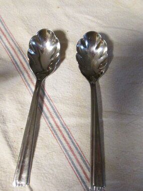 2 vtg Wm Rogers scalloped stainless spoons USA with hallmarks